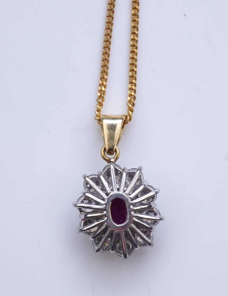 A ruby and diamond pendant